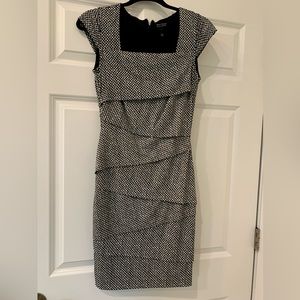 Women’s black and white dress with instant slimming support